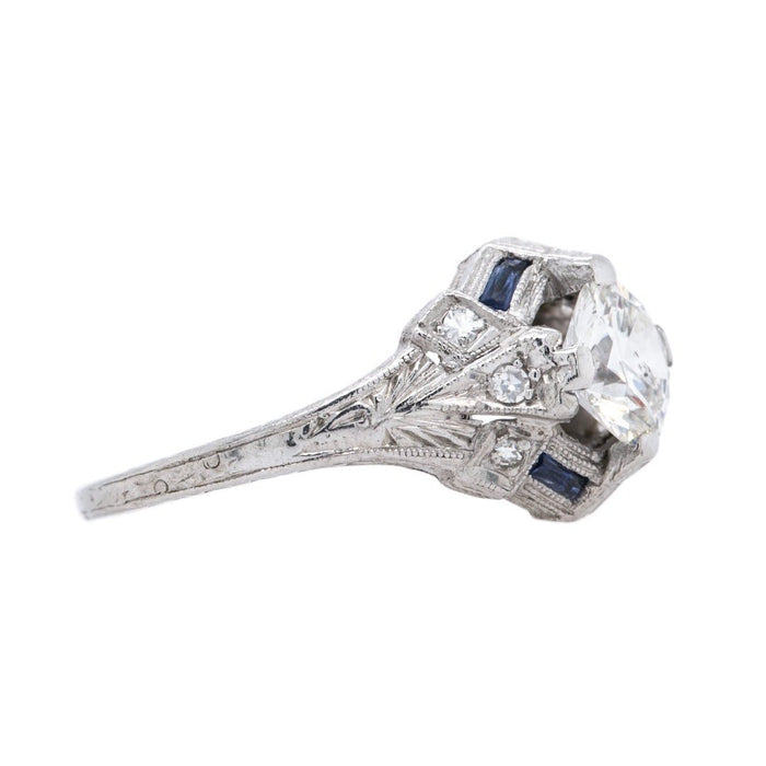 A Dazzling Art Deco Era Platinum, Diamond and Sapphire Engagement Ring